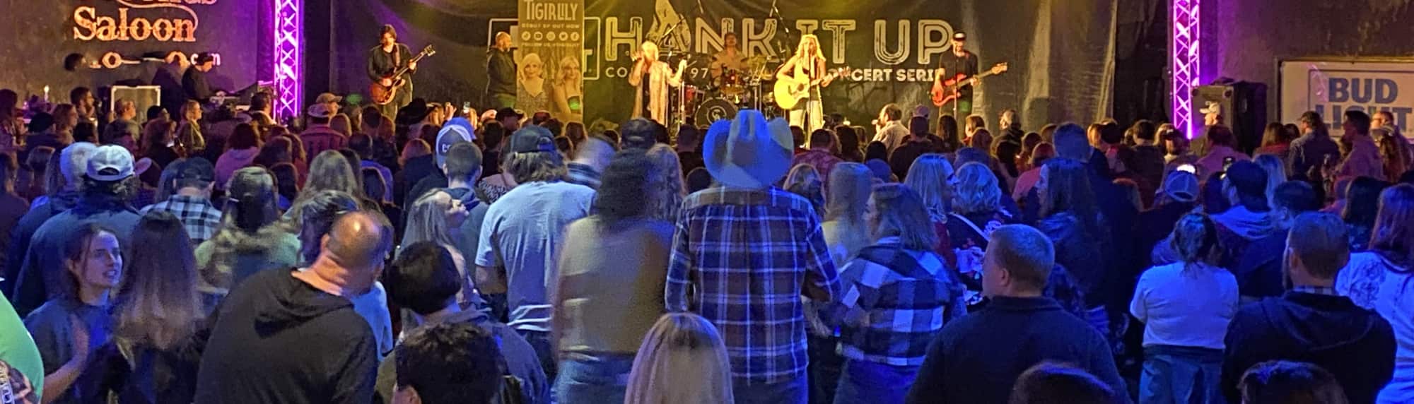 country concert with fans wearing cowboy hats Myrtle Beach
